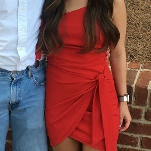 Red one shoulder wrap dress